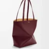 Bolso tote Puzzle Fold mediano en piel de becerro brillante color burdeos oscuro Bolso tote Puzzle Fold mediano en piel de becerro brillante color burdeos oscuro