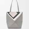 Bolso tote Puzzle Fold mediano en piel de becerro napa Gris/Light Ghost Bolso tote Puzzle Fold mediano en piel de becerro napa Gris/Light Ghost