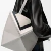Bolso tote Puzzle Fold mediano en piel de becerro napa Gris/Light Ghost Bolso tote Puzzle Fold mediano en piel de becerro napa Gris/Light Ghost