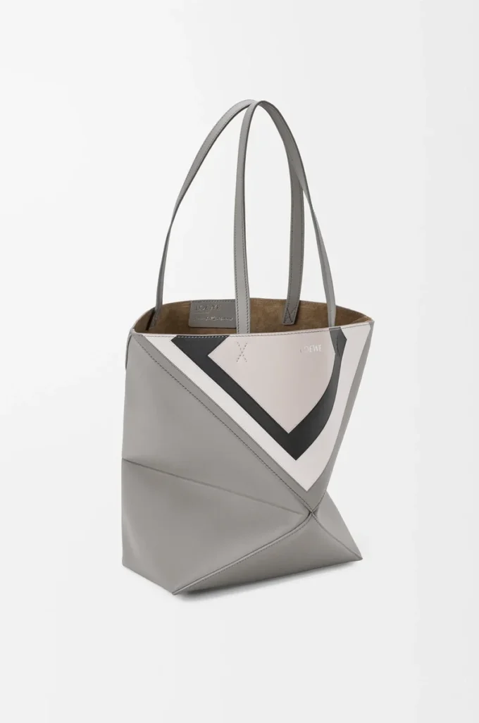 Bolso tote Puzzle Fold mediano en piel de becerro napa Gris/Light Ghost Bolso tote Puzzle Fold mediano en piel de becerro napa Gris/Light Ghost