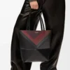 Bolso tote Puzzle Fold mediano en piel de becerro napa Negro/Burdeos Bolso tote Puzzle Fold mediano en piel de becerro napa Negro/Burdeos