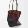 Bolso tote Puzzle Fold mediano en piel de becerro napa Negro/Burdeos Bolso tote Puzzle Fold mediano en piel de becerro napa Negro/Burdeos