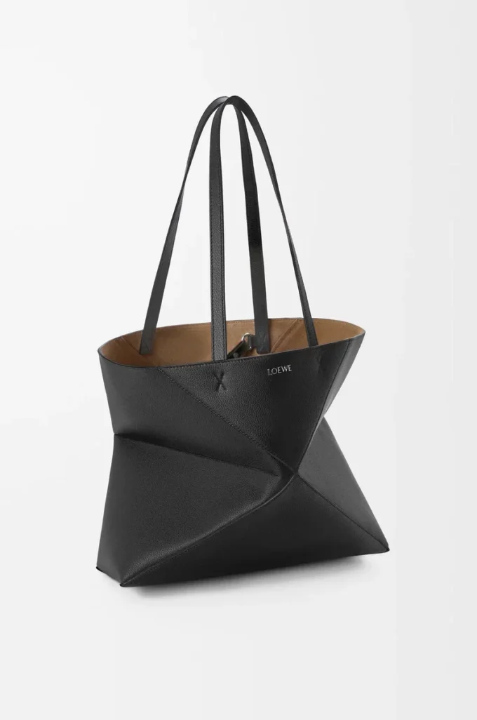 Bolso tote Puzzle Fold mediano horizontal en piel de becerro granulada suave, color negro Bolso tote Puzzle Fold mediano horizontal en piel de becerro granulada suave, color negro