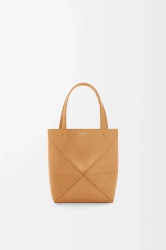 Bolso tote Puzzle Fold mini en piel de becerro brillante Warm Desert Bolso tote Puzzle Fold mini en piel de becerro brillante Warm Desert