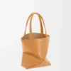 Bolso tote Puzzle Fold mini en piel de becerro brillante Warm Desert Bolso tote Puzzle Fold mini en piel de becerro brillante Warm Desert