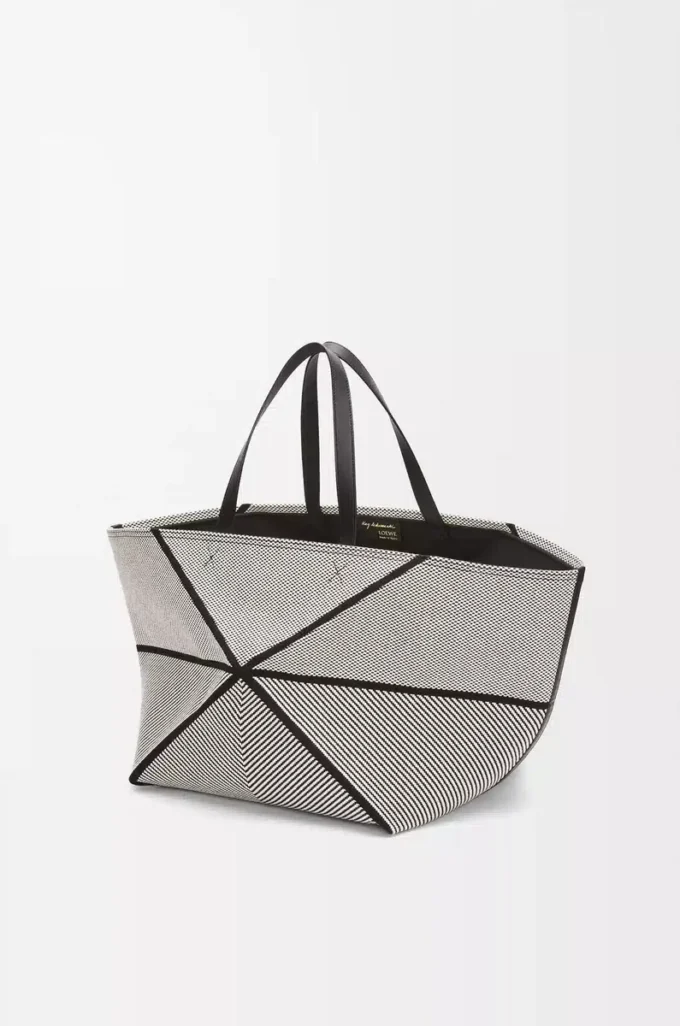 Bolso tote Puzzle Fold XXL en lona jacquard y piel de becerro Natural/Negro Bolso tote Puzzle Fold XXL en lona jacquard y piel de becerro Natural/Negro
