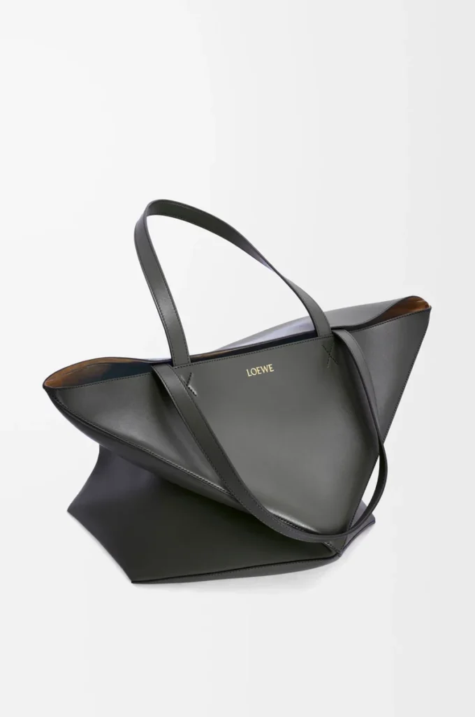Bolso tote XL Puzzle Fold en piel de becerro brillante, color negro