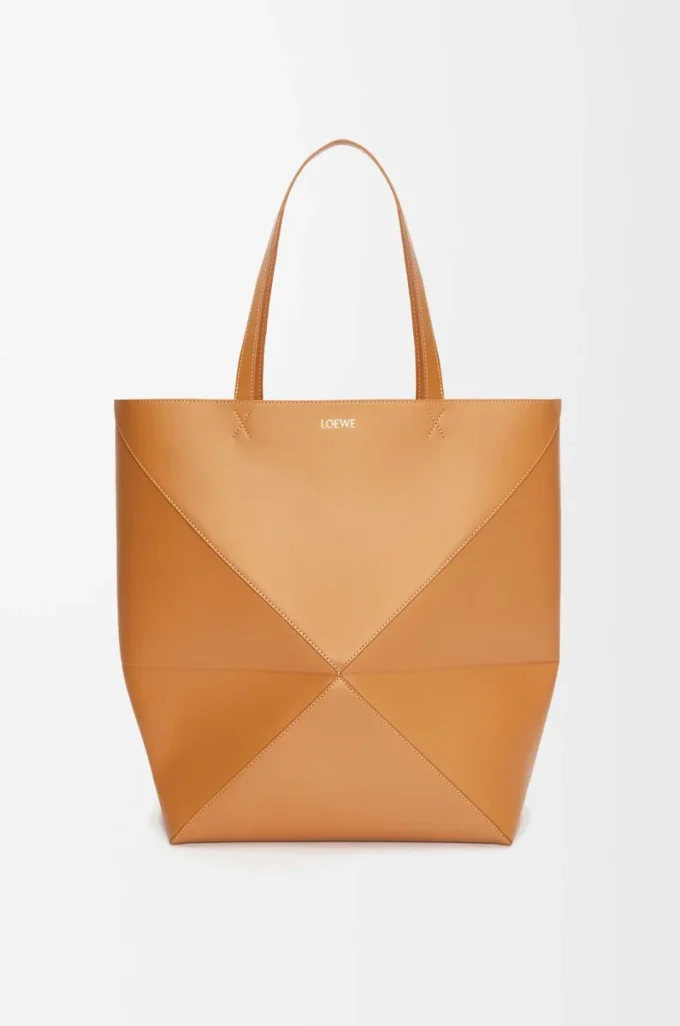 Bolso tote XL Puzzle Fold en piel de becerro brillante Warm Desert Bolso tote XL Puzzle Fold en piel de becerro brillante Warm Desert
