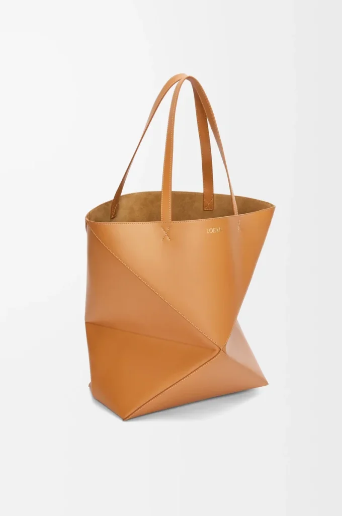 Bolso tote XL Puzzle Fold en piel de becerro brillante Warm Desert Bolso tote XL Puzzle Fold en piel de becerro brillante Warm Desert
