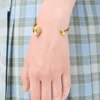 Brazalete Anagram Pebble en plata de ley Oro Brazalete Anagram Pebble en plata de ley Oro