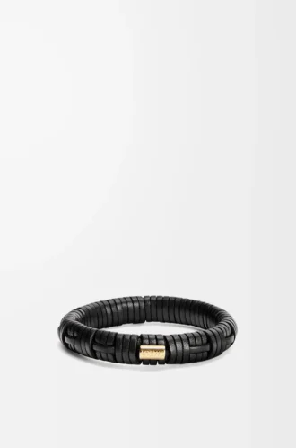 Brazalete tejido en latón y piel de becerro clásica. Negro