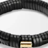Brazalete tejido en latón y piel de becerro clásica. Negro Brazalete tejido en latón y piel de becerro clásica. Negro