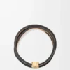 Brazalete trenzado en piel de becerro color tostado Brazalete trenzado en piel de becerro color tostado