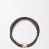 Brazalete Twist en piel de becerro blanco suave Brazalete Twist en piel de becerro blanco suave