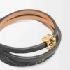 Brazalete Twist en piel de becerro negro Brazalete Twist en piel de becerro negro
