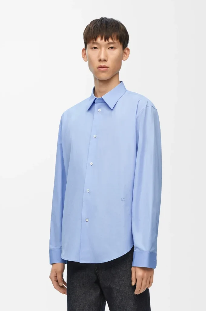 Camisa de algodón azul claro Camisa de algodón azul claro