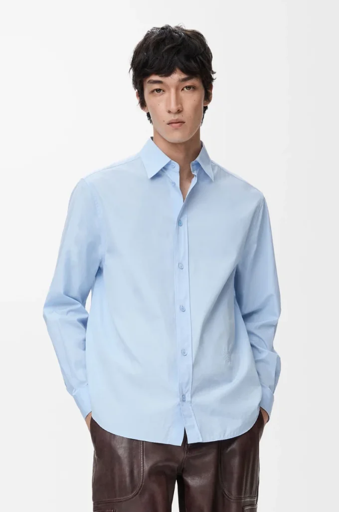 Camisa de algodón azul claro Camisa de algodón azul claro