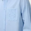 Camisa de algodón azul claro Camisa de algodón azul claro