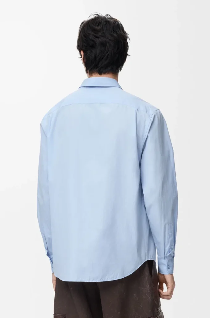 Camisa de algodón azul claro Camisa de algodón azul claro
