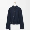 Camisa drapeada en denim azul índigo Camisa drapeada en denim azul índigo