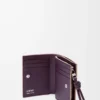 Cartera compacta Knot en piel de becerro napa brillante Clay/Plum Cartera compacta Knot en piel de becerro napa brillante Clay/Plum