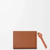 Cartera compacta Knot en piel de becerro napa brillante color tostado/papaya