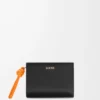 Cartera compacta Knot en piel de becerro napa brillante Negro/Naranja brillante Cartera compacta Knot en piel de becerro napa brillante Negro/Naranja brillante