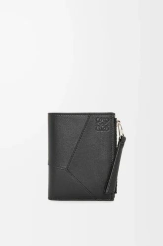 Cartera compacta y delgada Puzzle en piel de becerro clásica. Color negro.