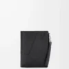 Cartera compacta y delgada Puzzle en piel de becerro granulada flexible. Negro