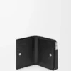 Cartera compacta y delgada Puzzle en piel de becerro granulada flexible. Negro