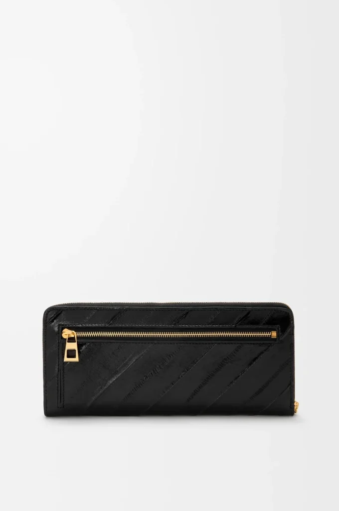 Cartera con cremallera alrededor y nudo en piel de anguila. Negro
