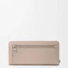 Cartera con cremallera y nudo en piel de becerro napa brillante Clay/Plum