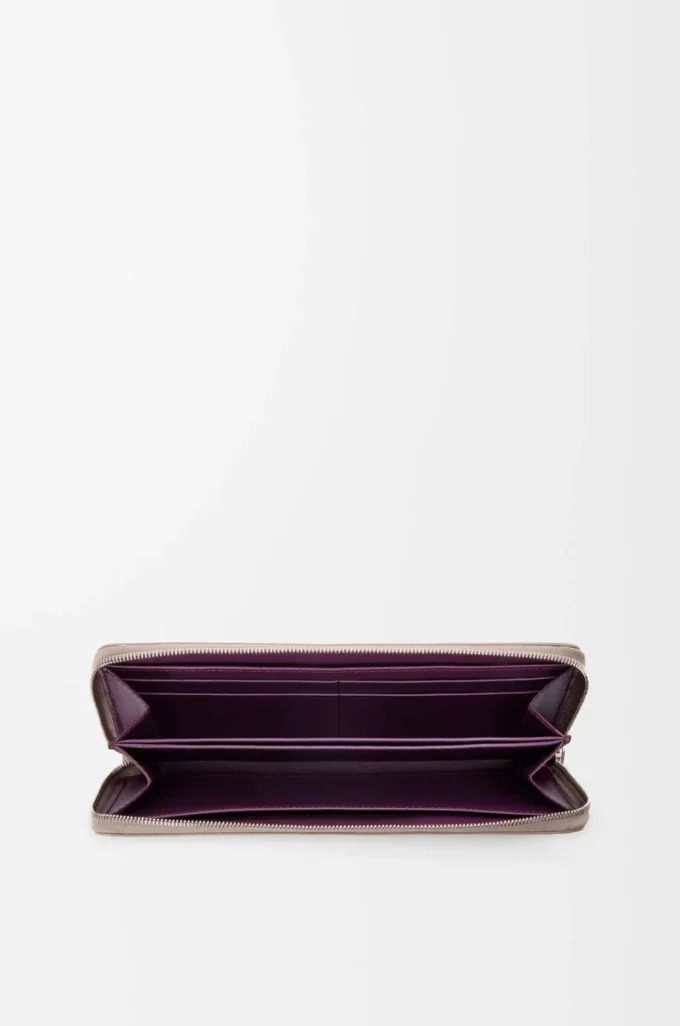 Cartera con cremallera y nudo en piel de becerro napa brillante Clay/Plum