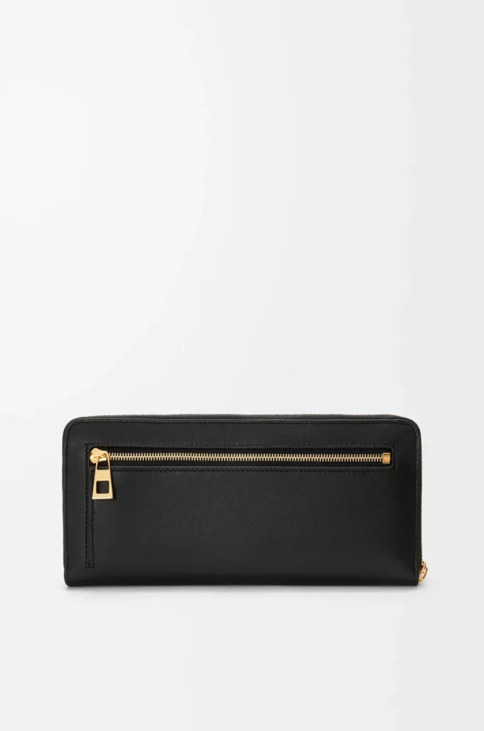 Cartera con cremallera y nudo en piel de becerro napa brillante. Negro/Ardilla