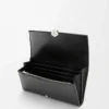 Cartera continental Pebble en piel de becerro mini grano. Negro Cartera continental Pebble en piel de becerro mini grano. Negro