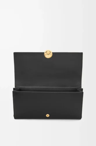 Cartera continental Pebble en piel de becerro napa brillante, color negro