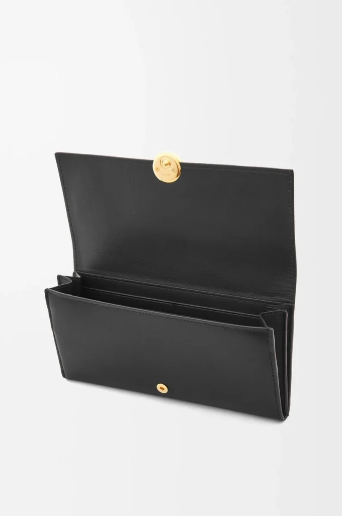 Cartera continental Pebble en piel de becerro napa brillante, color negro