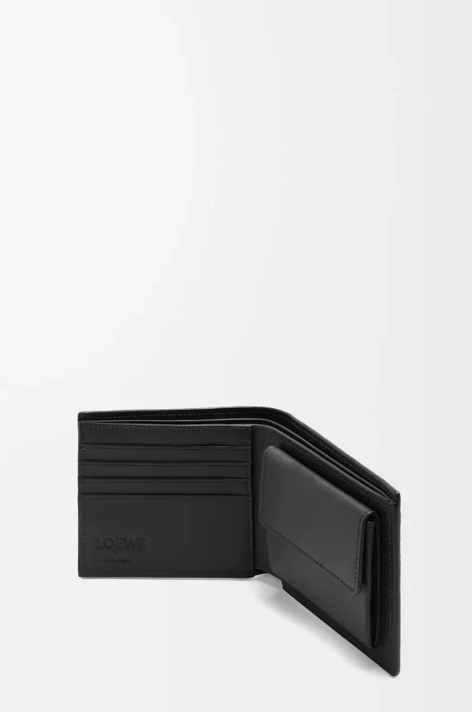 Cartera doble para monedas en piel de becerro clásica texturizada, color negro. Cartera doble para monedas en piel de becerro clásica texturizada, color negro.