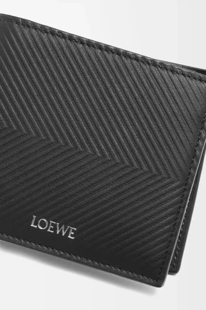 Cartera doble para monedas en piel de becerro clásica texturizada, color negro. Cartera doble para monedas en piel de becerro clásica texturizada, color negro.