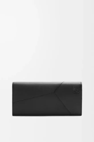 Cartera horizontal larga Puzzle en piel de becerro clásica.