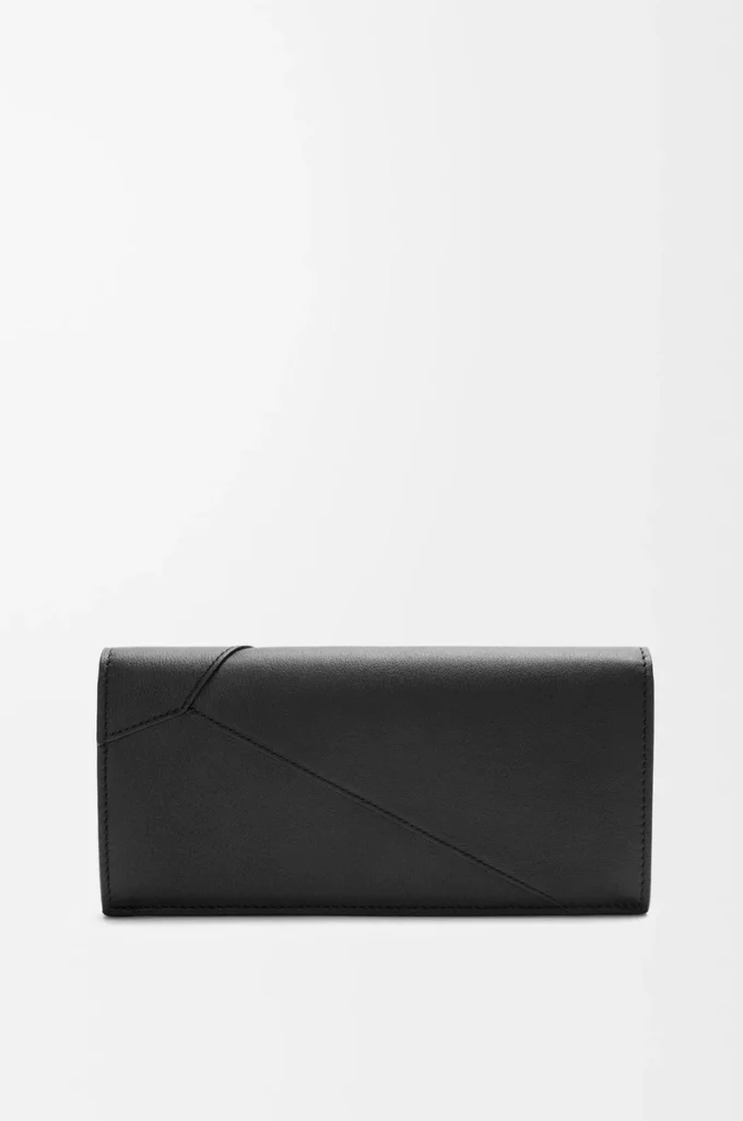 Cartera horizontal larga Puzzle en piel de becerro clásica.