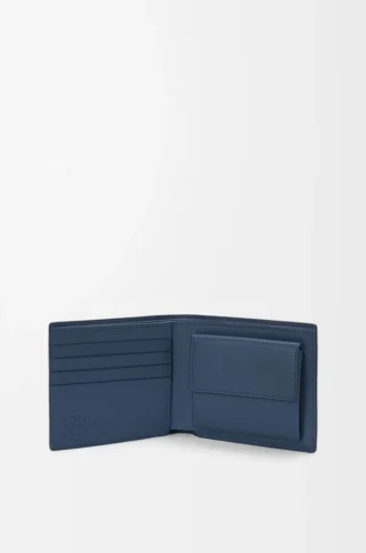 Cartera plegable para monedas en piel de becerro satinada teñida en índigo Cartera plegable para monedas en piel de becerro satinada teñida en índigo