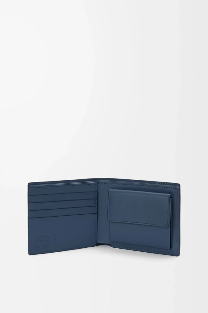 Cartera plegable para monedas en piel de becerro satinada teñida en índigo