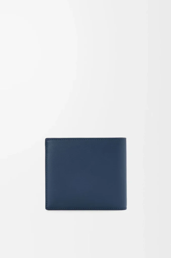 Cartera plegable para monedas en piel de becerro satinada teñida en índigo