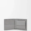 Cartera plegable para monedas Puzzle en piel de becerro clásica, color marrón invierno/gris ceniza. Cartera plegable para monedas Puzzle en piel de becerro clásica, color marrón invierno/gris ceniza.
