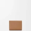 Cartera plegable Pebble en piel de becerro granulado color moca Cartera plegable Pebble en piel de becerro granulado color moca