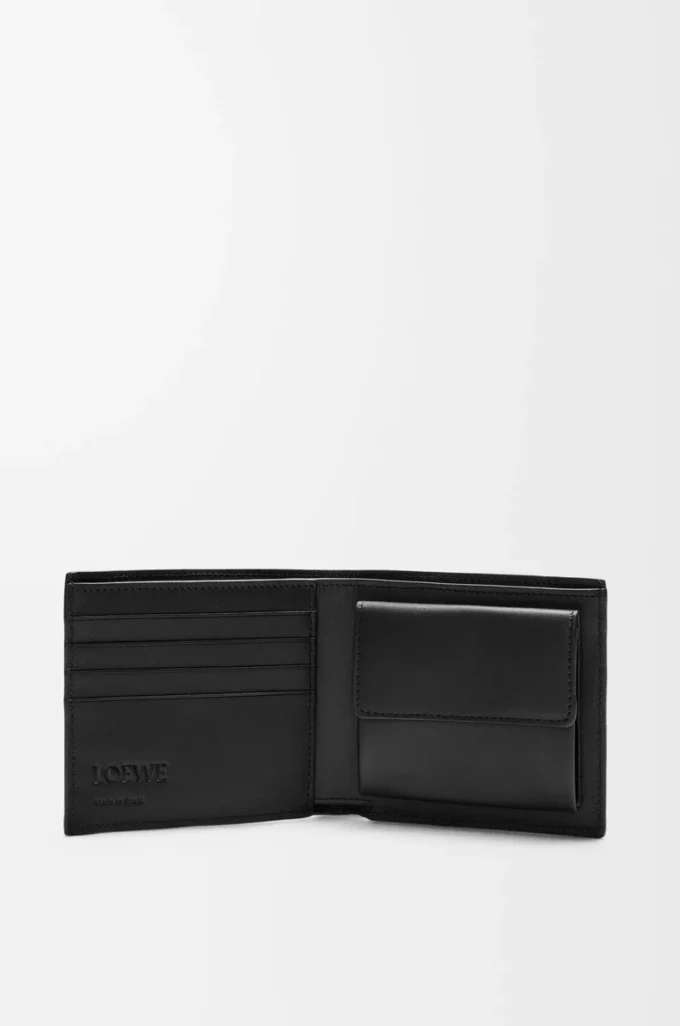 Cartera plegable Puzzle para monedas en piel de becerro clásica. Negro Cartera plegable Puzzle para monedas en piel de becerro clásica. Negro