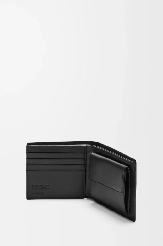 Cartera plegable Puzzle para monedas en piel de becerro clásica. Negro Cartera plegable Puzzle para monedas en piel de becerro clásica. Negro