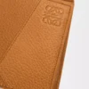 Cartera plegable Puzzle para monedas en piel de becerro granulada flexible, color marrón claro cañón