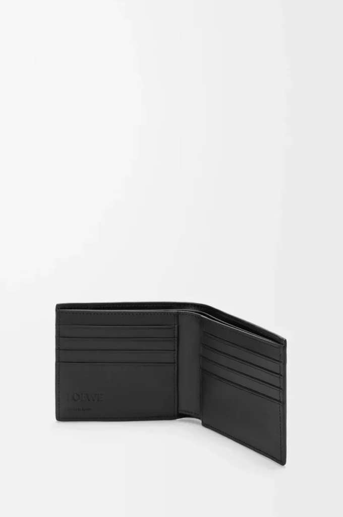 Cartera Puzzle con doble pliegue en piel de becerro granulada flexible, color negro
